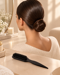 A flawless sleek bun styled with SwishSleek