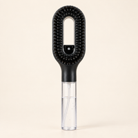 SwishMist 2-in-1 Smoothing Brush, matte black with clear water reservoir