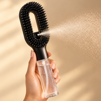 SwishMist spraying an ultra-fine mist through the open brush head
